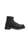 Alexander Mcqueen Chunky Sole Round Toe Studded Ankle Boots In Black