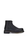 Alexander Mcqueen Chunky Sole Round Toe Studded Ankle Boots In Black