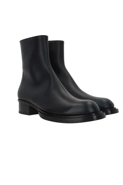 Alexander Mcqueen Boots In Black