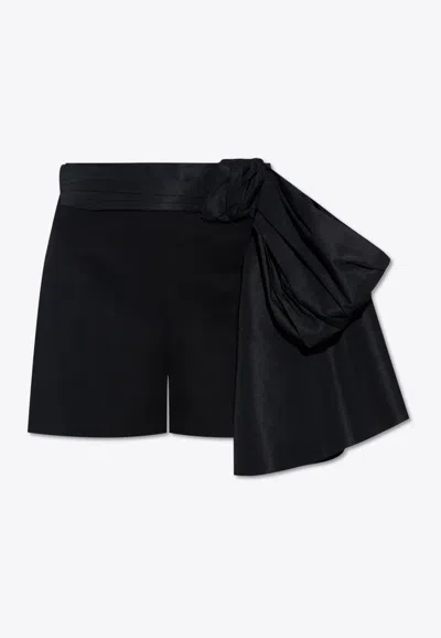 Alexander Mcqueen Bow Embellished Mini Tailored Shorts In Black