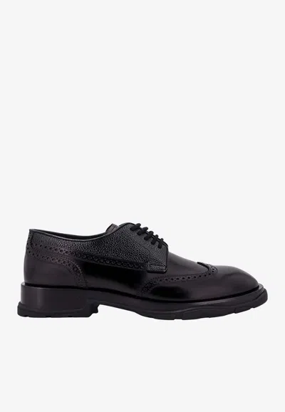 Alexander Mcqueen Brogue Detail Leather Derby Shoes In Black
