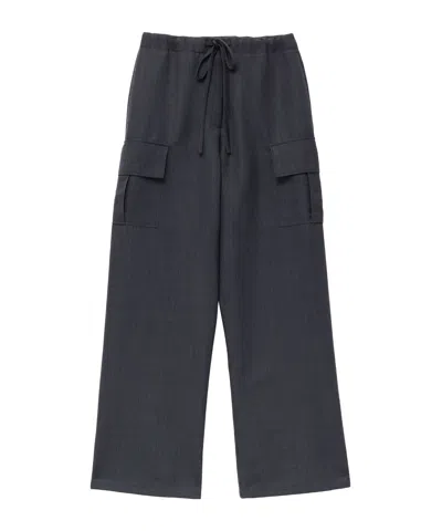 Alexander Mcqueen Prince Of Wales Cargo Trousers In Black