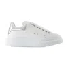 Alexander Mcqueen Chunky Sole Oversized Sneakers With Metallic Heel Tab
