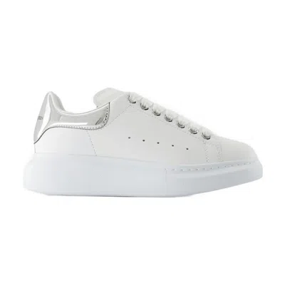 Alexander Mcqueen Chunky Sole Oversized Sneakers With Metallic Heel Tab