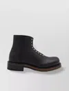 Alexander Mcqueen Chunky Sole Round Toe Studded Ankle Boots In Black