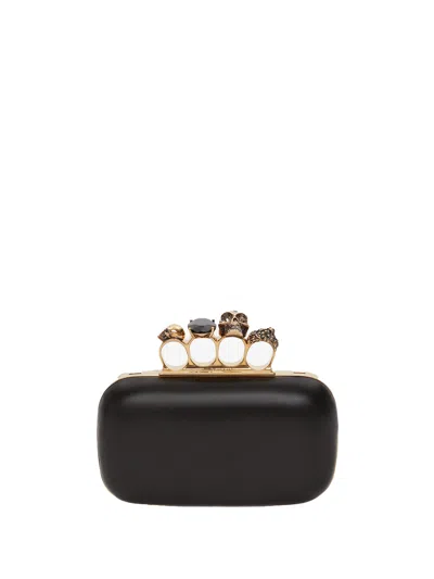 Alexander Mcqueen Skull Four Ring Embellished Clutch In Black