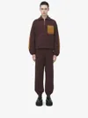 Alexander Mcqueen Contrast-pocket Track Trousers In Brown