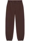 Alexander Mcqueen Contrast-pocket Track Trousers In Brown