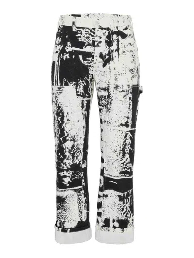 ALEXANDER MCQUEEN CROPPED JEANS WITH PRINT