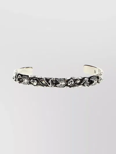 Alexander Mcqueen Cuff With Polished Skull Detailing In Metallic
