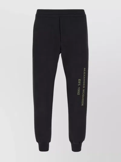 Alexander Mcqueen Cuffed Hems Cotton Stretch Joggers In Black