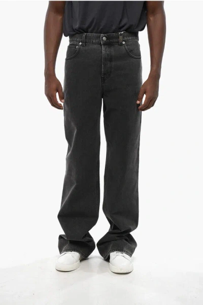 Alexander Mcqueen Dark-washed Baggy Jeans With Textured Leather Logo Patch 28c In Black