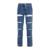 Alexander Mcqueen Low-rise Distressed Jeans In Blue
