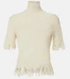 Alexander Mcqueen Distressed Cotton And Silk-blend Lace Turtleneck Sweater In White