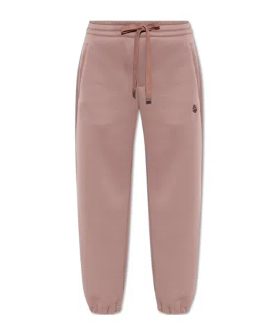 Alexander Mcqueen Embroidered -skull Track Pants In Pink