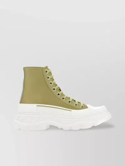 Alexander Mcqueen Embossed Logo High-top Sneakers In Green