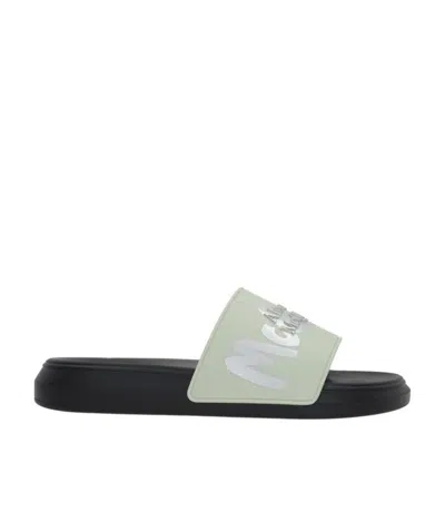 Alexander Mcqueen Embossed-logo Open Toe Slides In Green