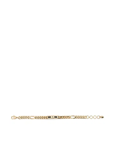 Alexander Mcqueen Embossed-skull Bracelet In Gold