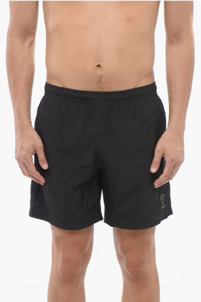 Alexander Mcqueen Embroidered Logo Skull Swimshorts In Black