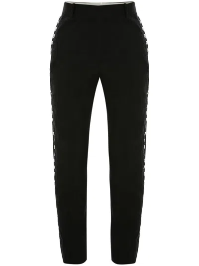 Alexander Mcqueen Eyelet Cigarette Trousers For Men In Black