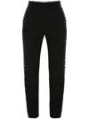 Alexander Mcqueen Eyelet-detail Slim-cut Trousers In Black