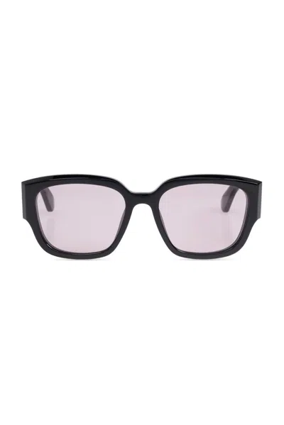 Alexander Mcqueen Engraved-logo Arm Sunglasses In Black