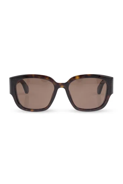 Alexander Mcqueen Engraved-logo Arm Sunglasses In Brown