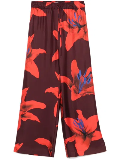 ALEXANDER MCQUEEN FLORAL-PRINT TROUSERS