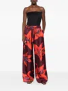 Alexander Mcqueen Floral-print Trousers In Red