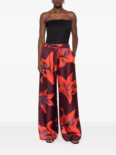 Alexander Mcqueen Floral-print Trousers In Red