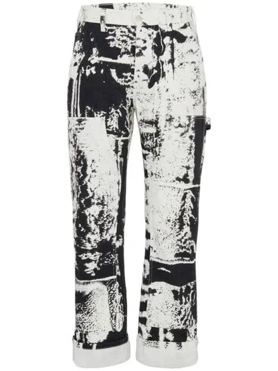 ALEXANDER MCQUEEN ALEXANDER MCQUEEN FOLD PRINT JEANS CLOTHING