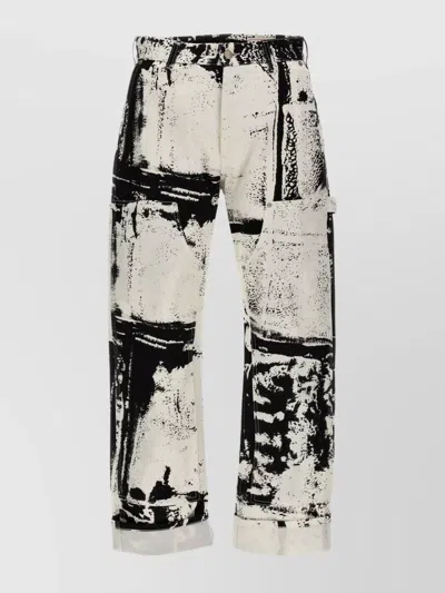 ALEXANDER MCQUEEN FOLDED PRINT DENIM TROUSERS