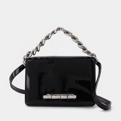 Alexander Mcqueen The Four Ring Mini Patent Leather Bag In Black