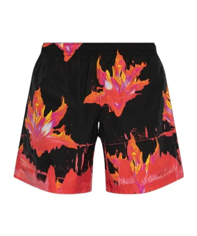 ALEXANDER MCQUEEN ALEXANDER MCQUEEN GAPHIC PRINTED SWIM SHORTS