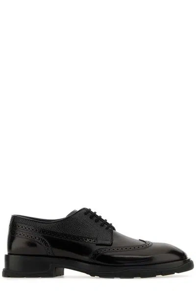 Alexander Mcqueen Geometric Cut Fringe Lace-up Brogues For Men In Black