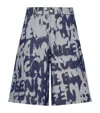 Alexander Mcqueen Graffiti Printed Bermuda Denim Shorts In Blue