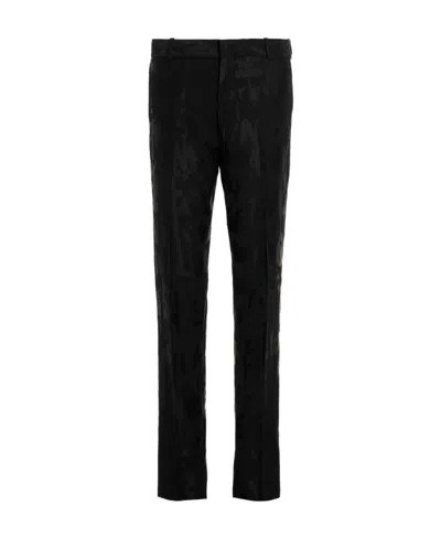 Alexander Mcqueen Graffiti Jacquard-logo Tailored Trousers In Black