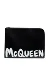 Alexander Mcqueen Graffiti Logo-print Clutch In Black