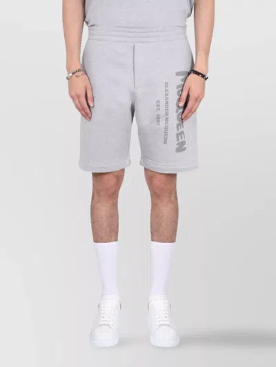 ALEXANDER MCQUEEN GRAFFITI LOGO PRINT KNEE LENGTH SHORTS