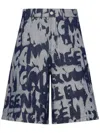 Alexander Mcqueen Graffiti Printed Bermuda Denim Shorts In Blue