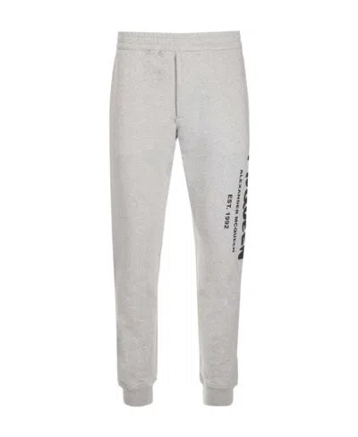 Alexander Mcqueen Graffiti-print Track Pants In Gray