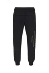 Alexander Mcqueen Graffiti Printed Track Trousers In Black