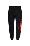 Alexander Mcqueen Mcqueen Graffiti Joggers In Black