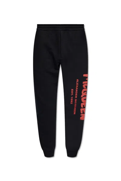 Alexander Mcqueen Mcqueen Graffiti Joggers In Black Lust Red