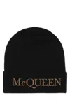 Alexander Mcqueen Embroidered-logo Ribbed Beanie In Black