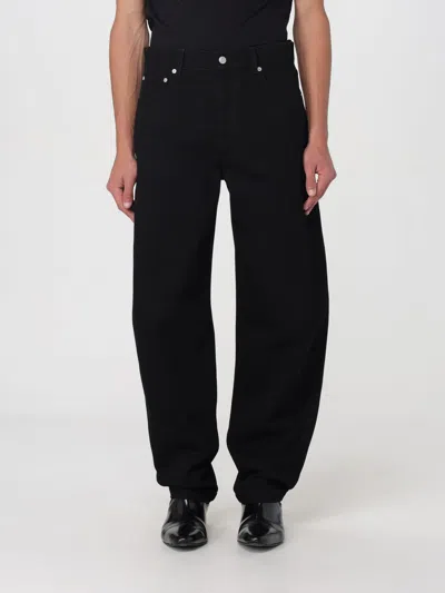 ALEXANDER MCQUEEN JEANS ALEXANDER MCQUEEN MEN COLOR BLACK,412606002