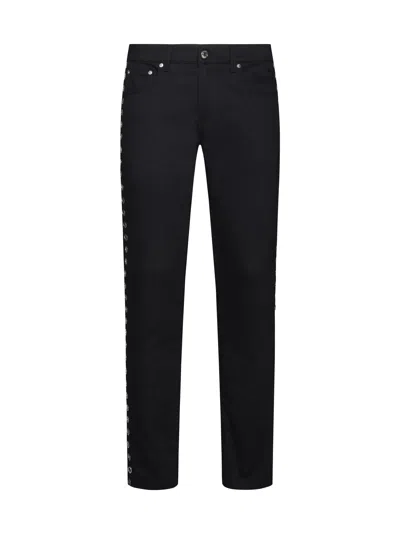 ALEXANDER MCQUEEN JEANS WITH EYELITS