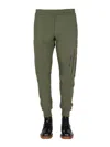 Alexander Mcqueen Jogging Pants With Graffiti Logo In Brown