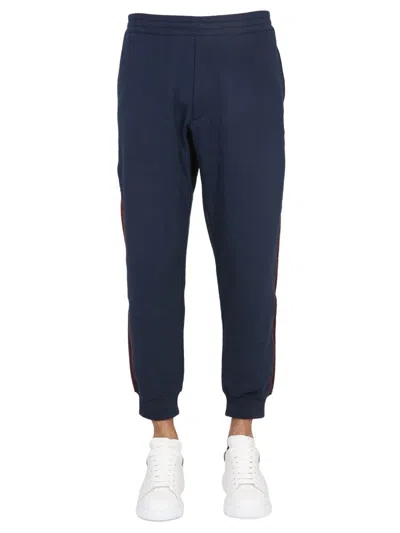 Alexander Mcqueen Jogging Pants With Selvedge Logo Band In Blue