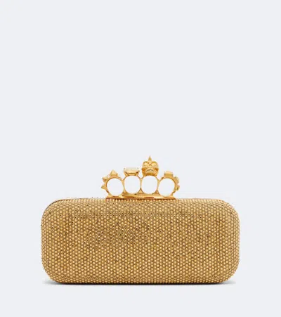 Alexander Mcqueen Knuckle Embellished Leather Clutch In Gold